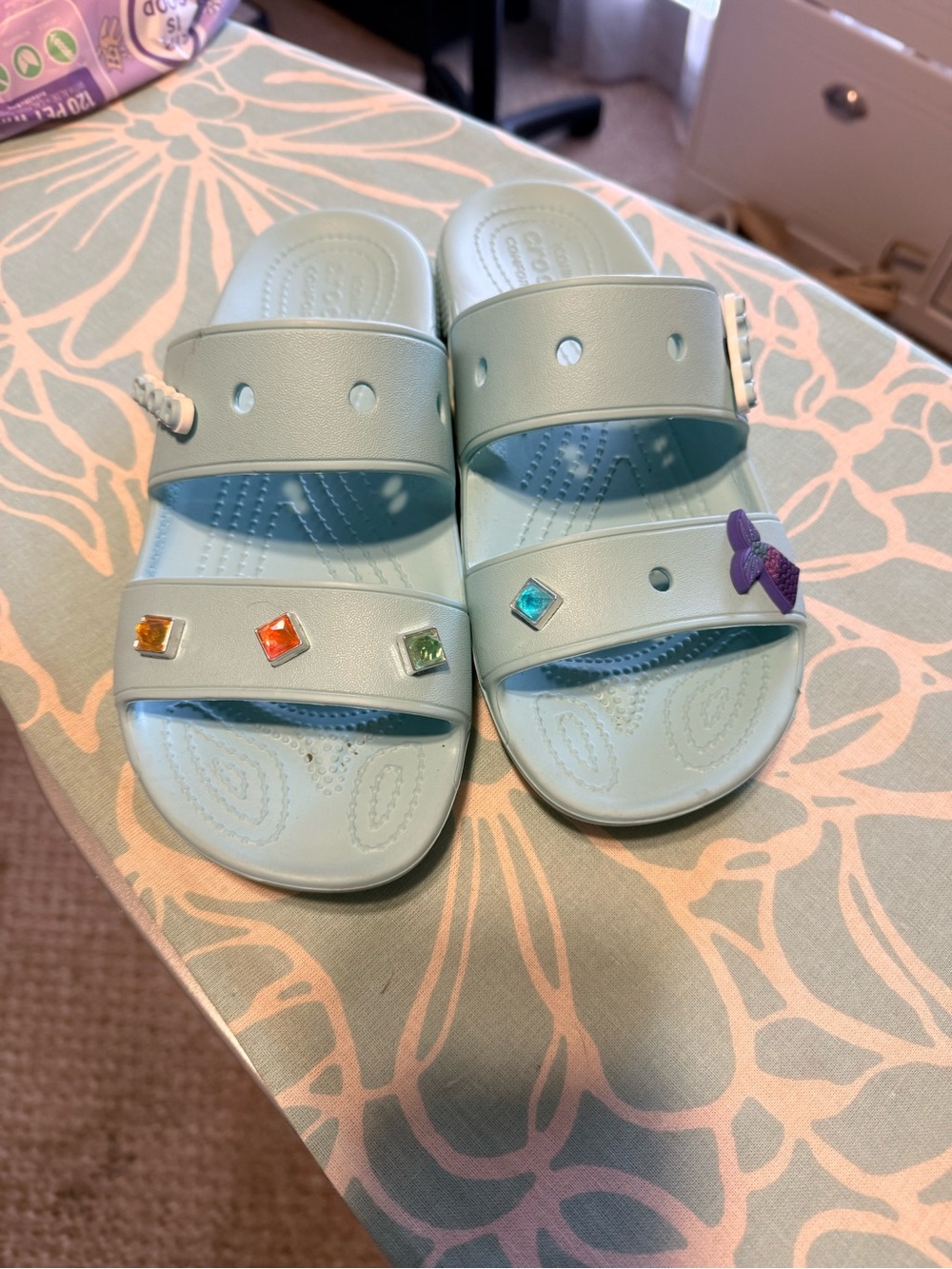 CROCS Light Blue Slide Sandals with Colorful Charm Accents